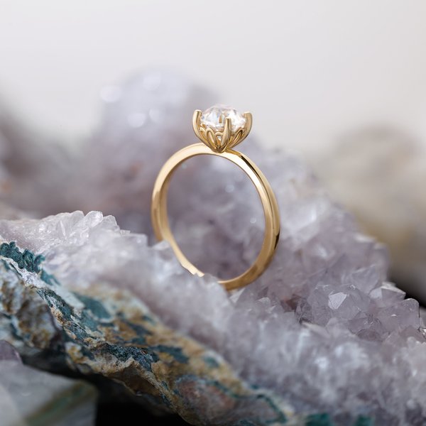 Gold solitaire ring — expert jewelry repair at Facets 58